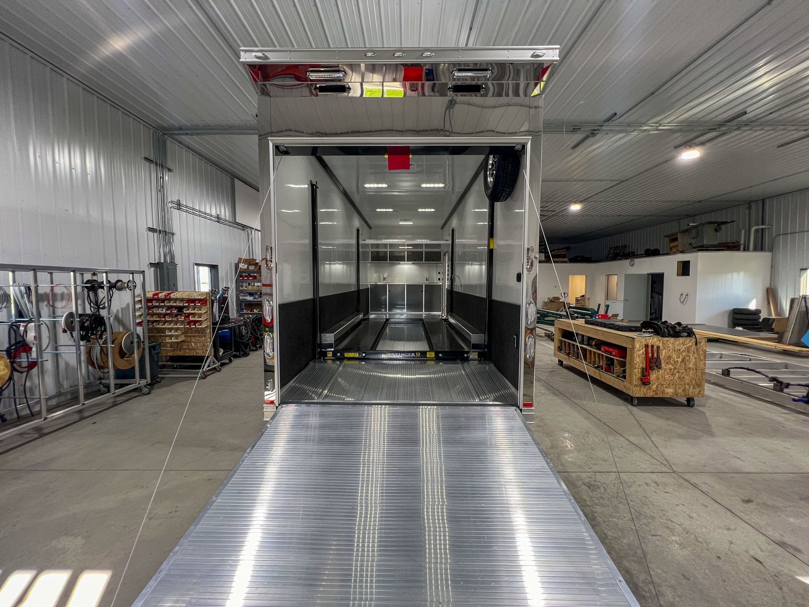 ATC Aluminum Trailer in front of the Precision Custom Services Shop