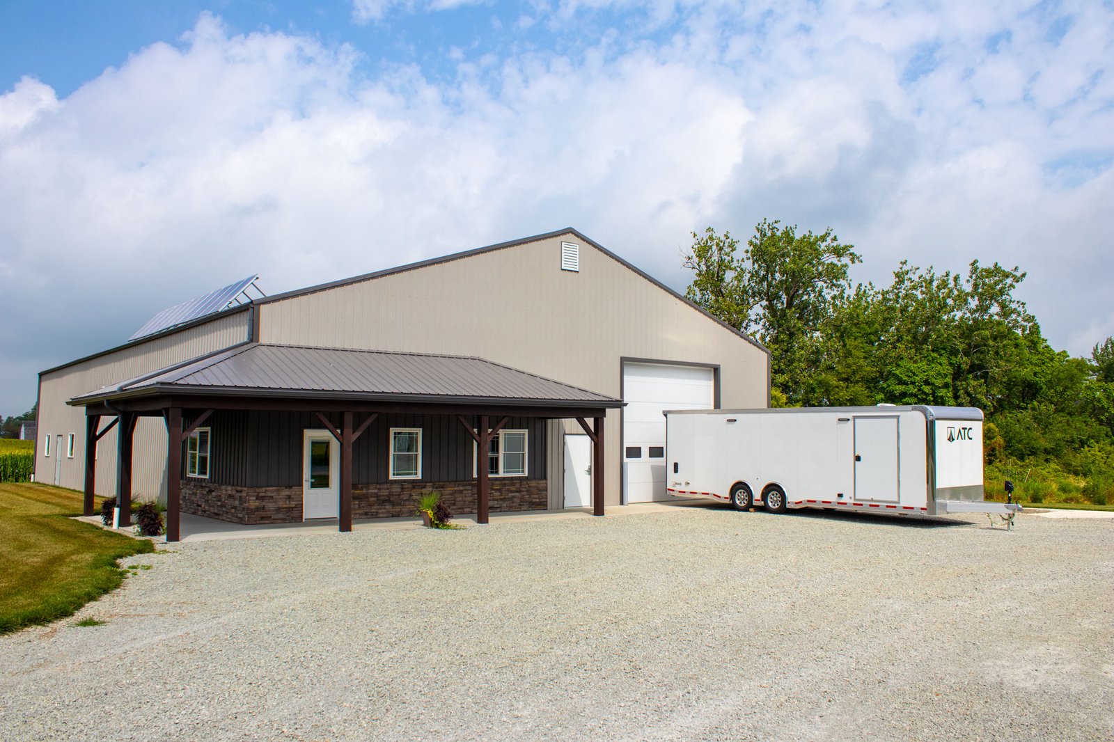 ATC Aluminum Trailer in front of the Precision Custom Services Shop